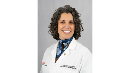 A picture of Nina O'Connell in her white coat