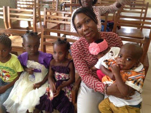 modupe coker with nigerian children