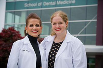 two female dentists standing together