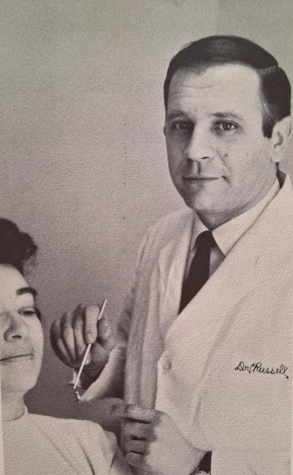 Richard Russell with a patient