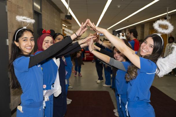 Students lined up to greet children
